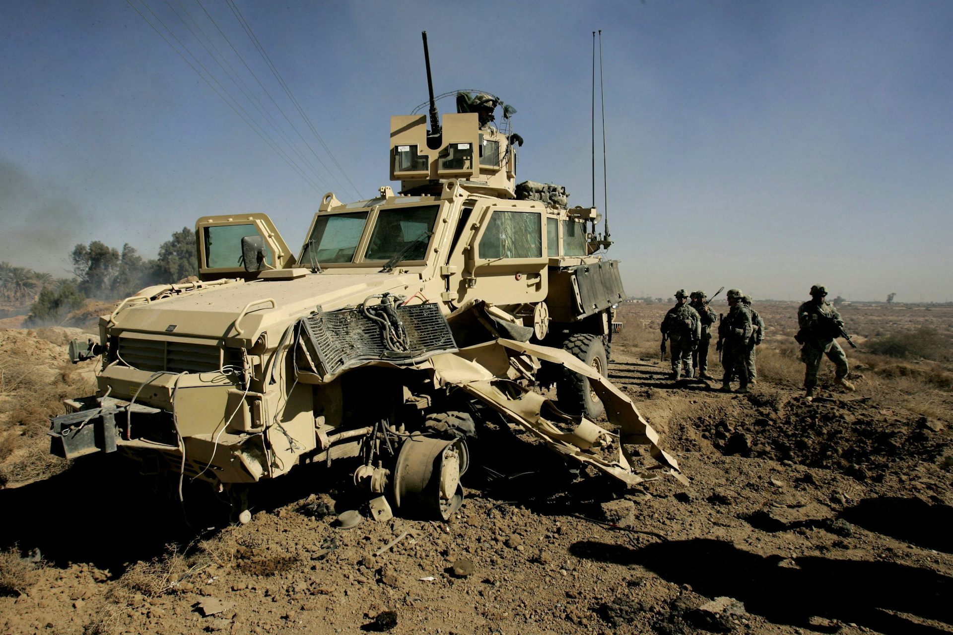 A heavily damaged military vehicle.