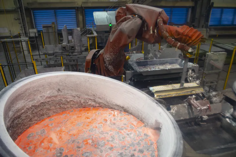 A steel drum full of molten aluminum