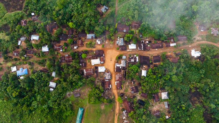 aerial shot of Nigerian settlement in forest