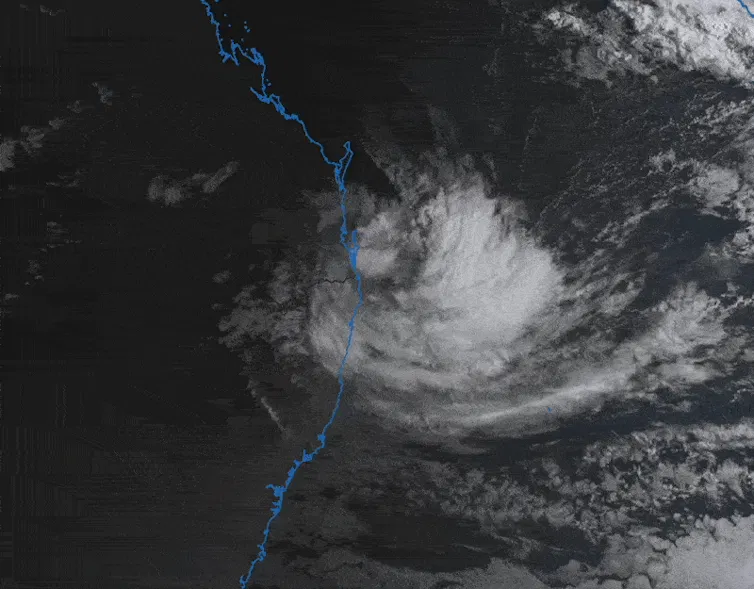 Satellite gif of ex-tropical cyclone Alfred hitting Queensland