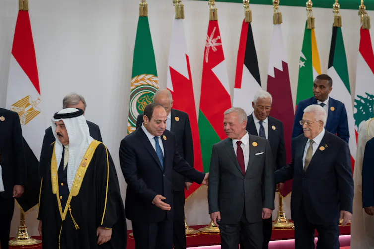 Arab leaders pose for a group photo.