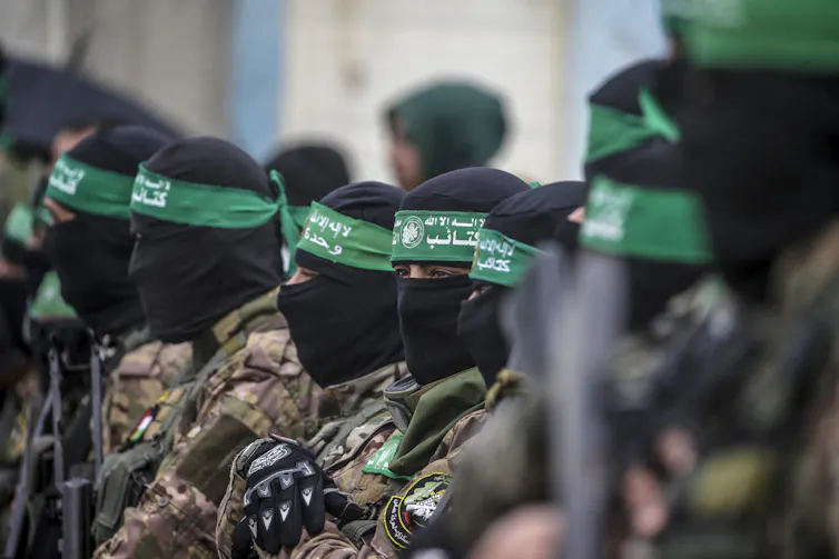 Hamas militants stood in a line.