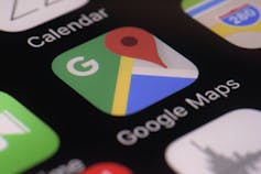 A smartphone with the Google Maps icon.