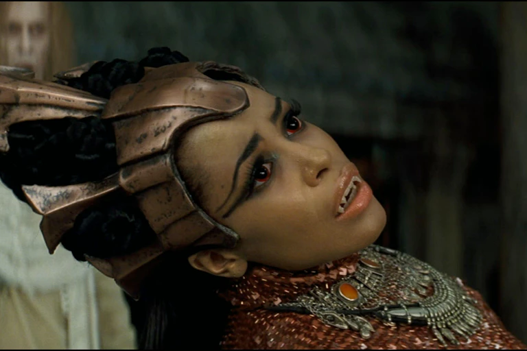 Aaliyah in a headdress and heavy ancient Egyptian-style eye make up