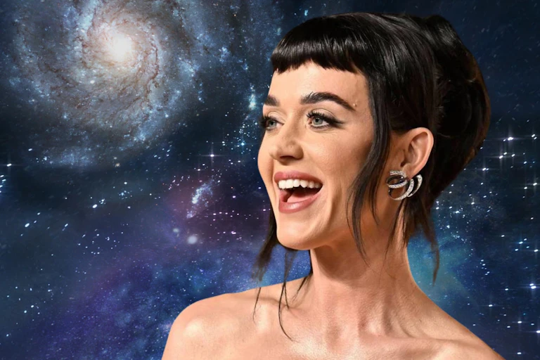 Katy Perry with a space backdrop