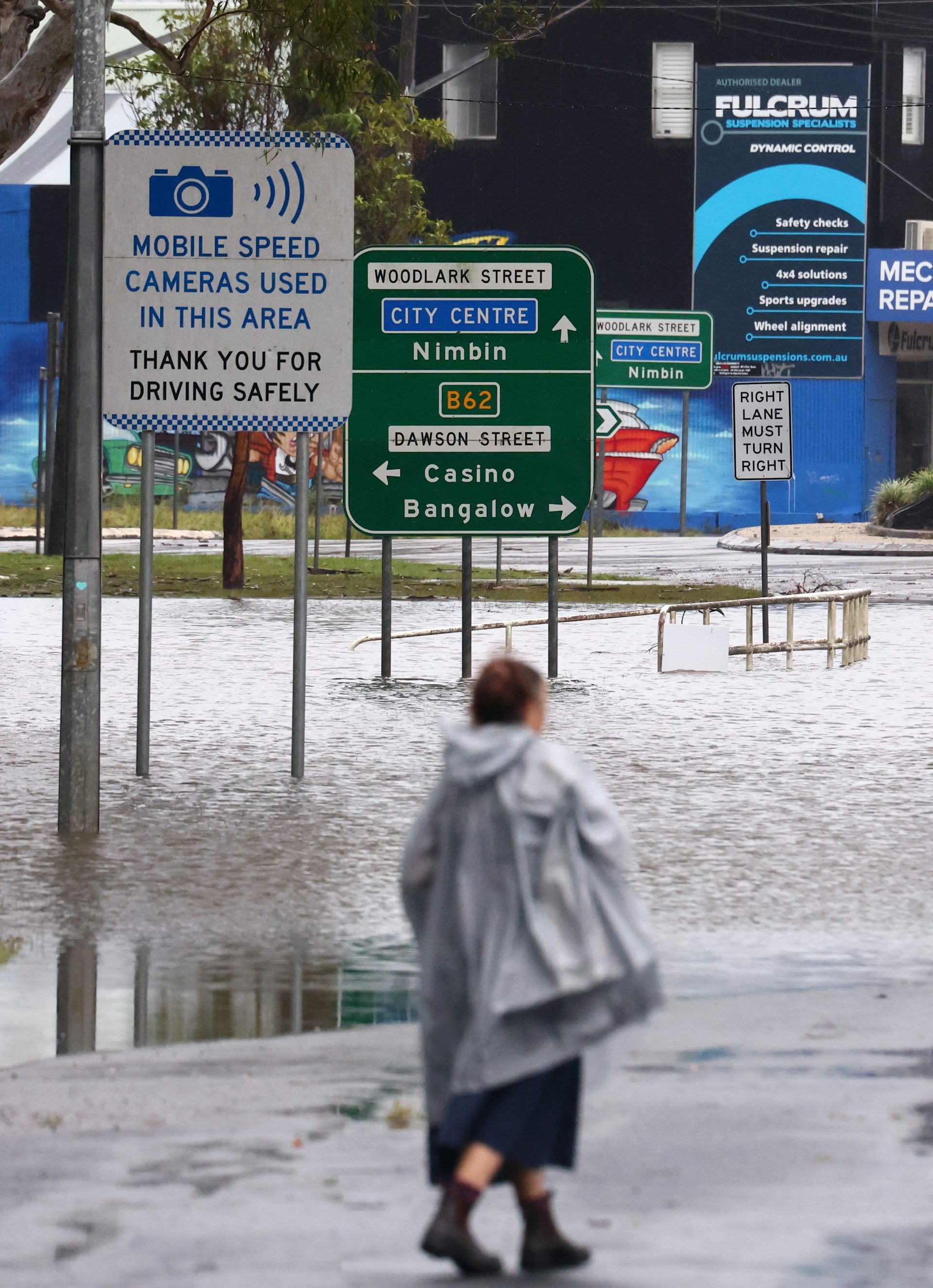 Scenes on a flooded Woodlark St in Lismore.