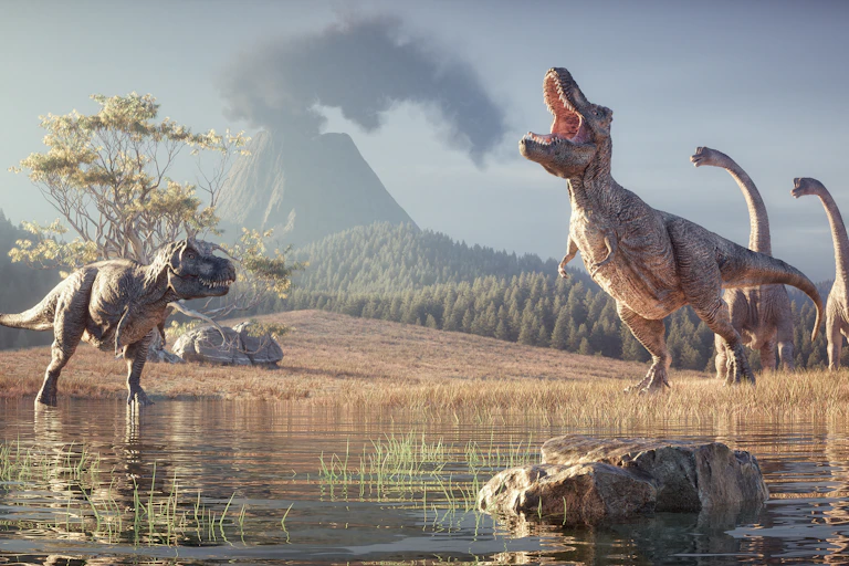 Dinosaurs with a volcano in the background