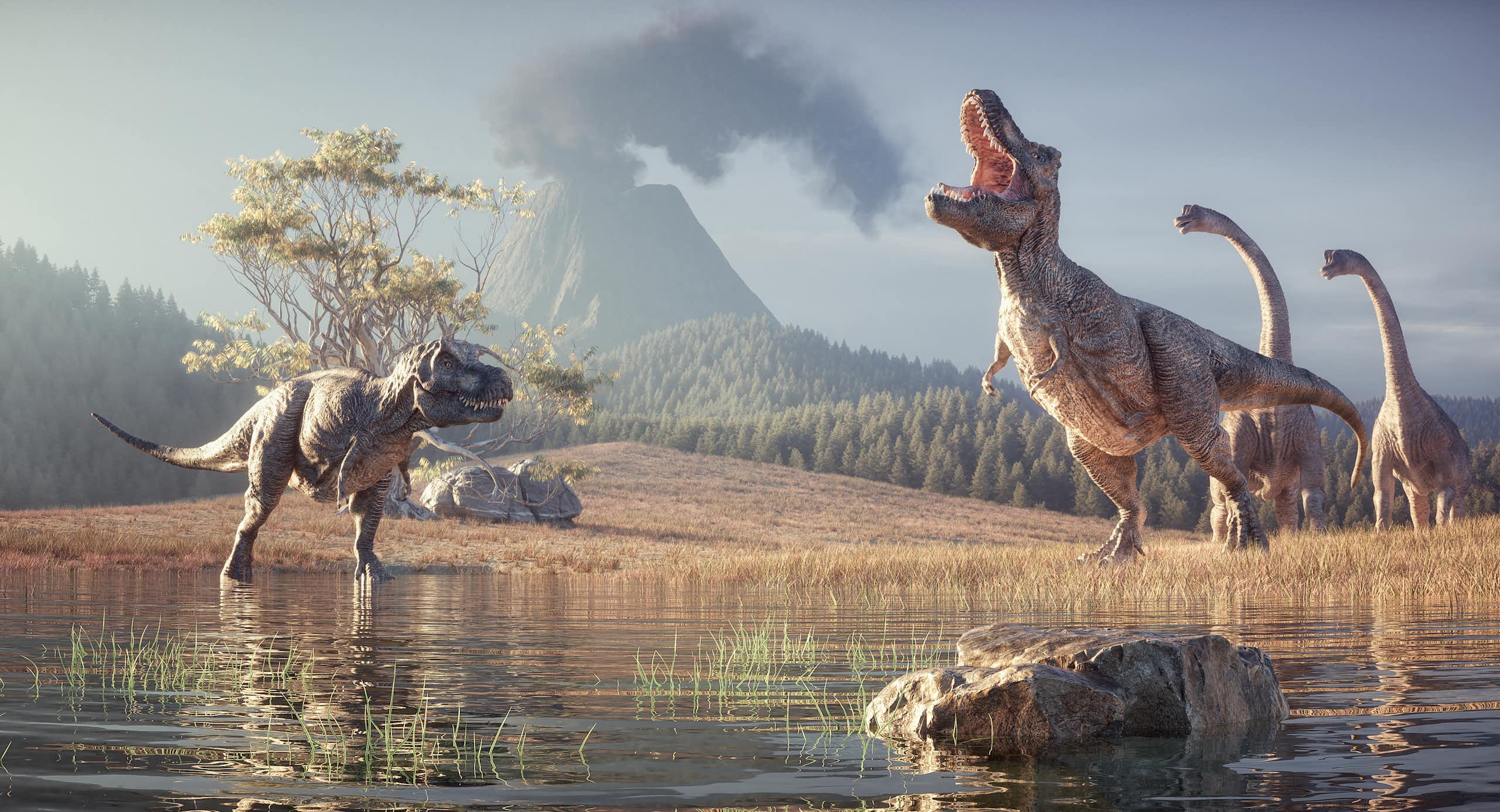Dinosaurs with a volcano in the background