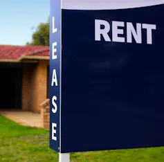 Lease rent sign in front of a house