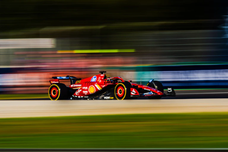 Motion blur of a red race car.