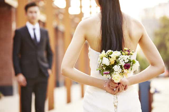 A Chinese couple on their wedding day.