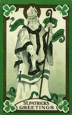 A green card showing St Patrick and clovers