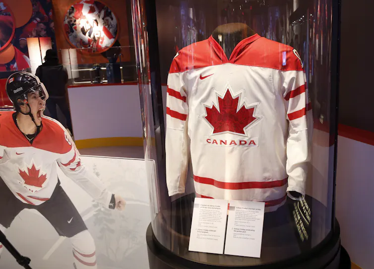 A Canada hockey jersey seen in a cabinet.