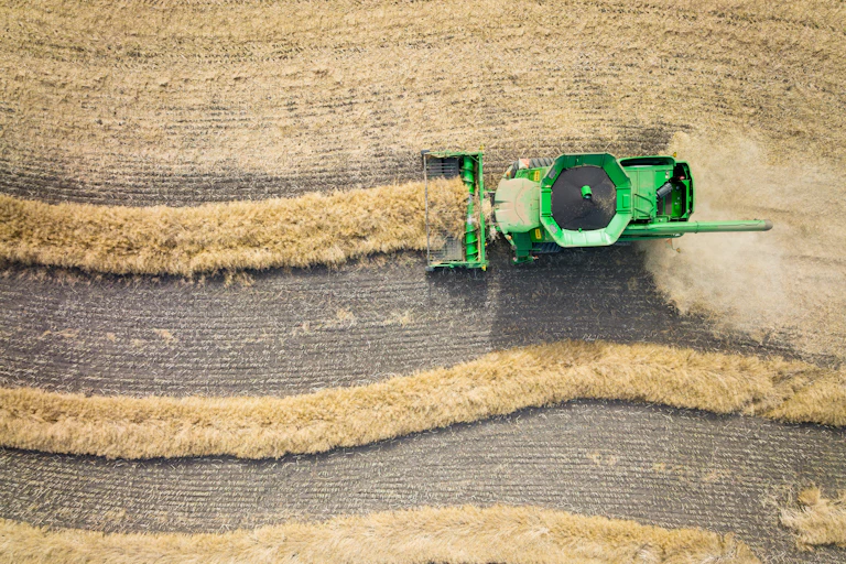 tractor harvesting crop