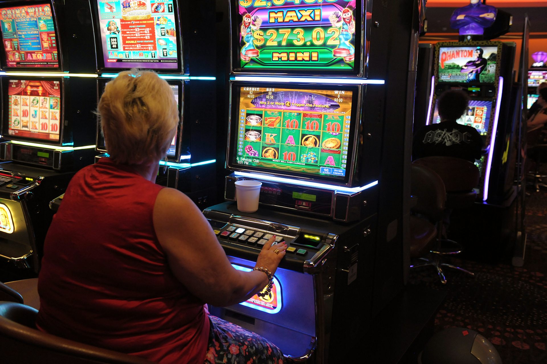 Person using a poker machine