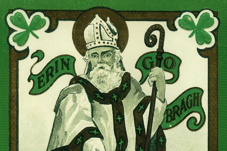 Postal de celebración del día de san Patricio de 1909 en la que se representa al santo y el característico color verde de la festividad."
