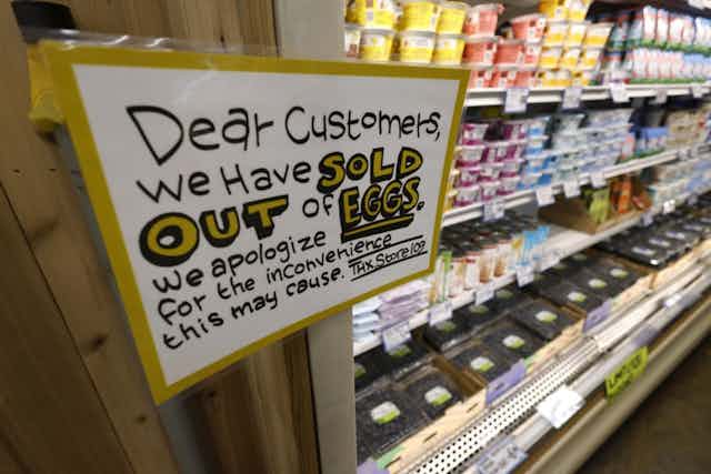 A sign in a US shop saying they had sold out of eggs.