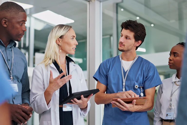 A group of health-care workers talking