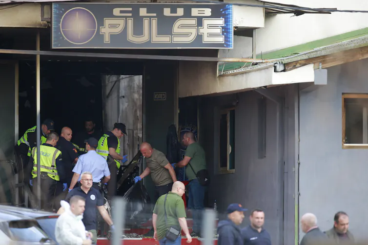 Investigators out the front of the Pulse nightclub.