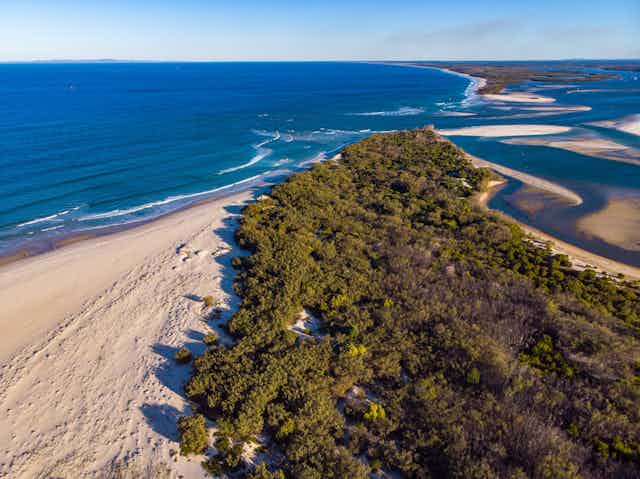 sandy island and ocean