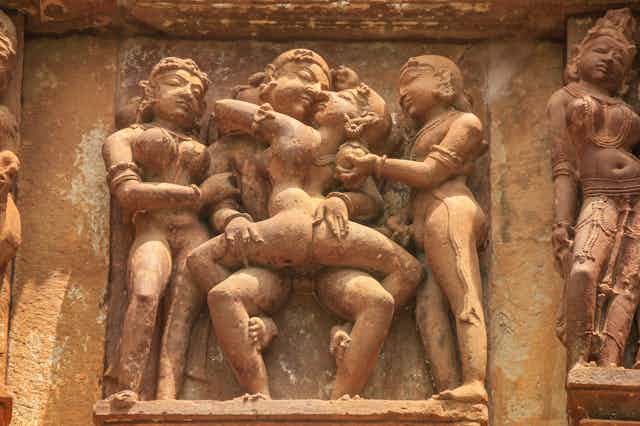 An erotic scene on the outer wall of an Indian temple.