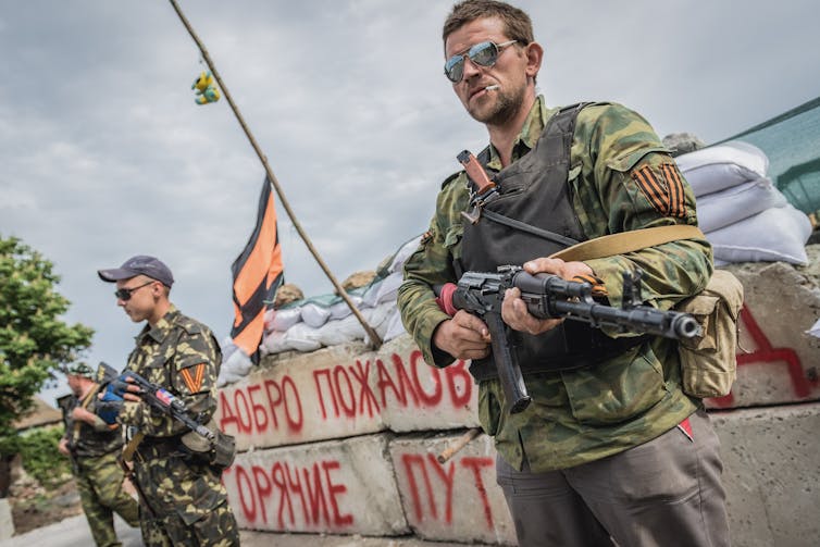 Russia-backed separatists stand at their post in Sloviansk, Ukraine.