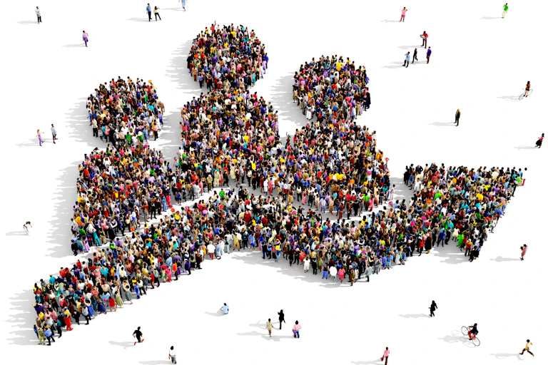 image made up of people showing population graph with increasing arrow towards the right