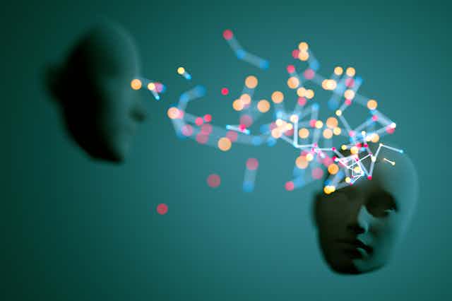 two disembodied faces with colored dots connected by lines floating between the faces