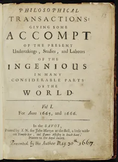 A title page on faded, stained, yellow paper.