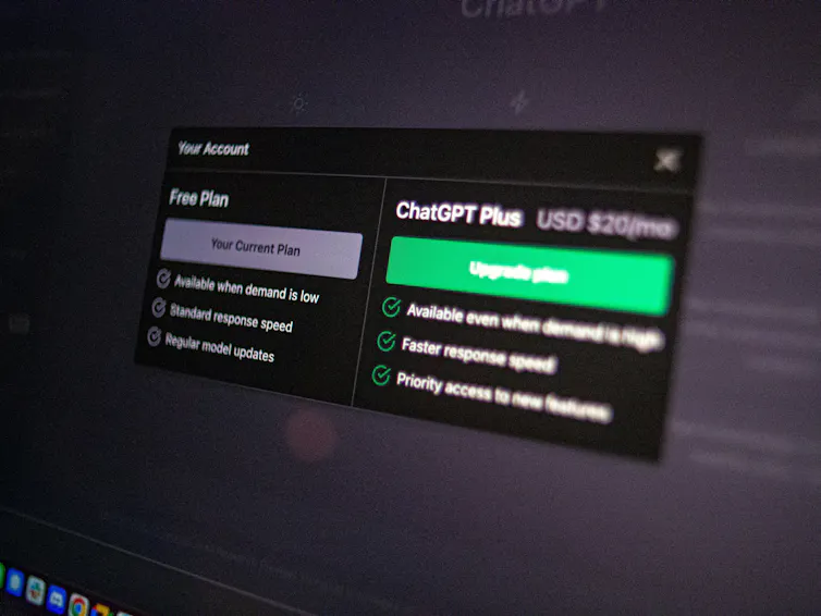 Photo of a computer screen showing a popup window offering ChatGPT Plus subscriptions.