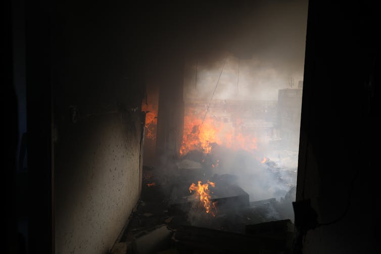 A fire and smoke in a building.