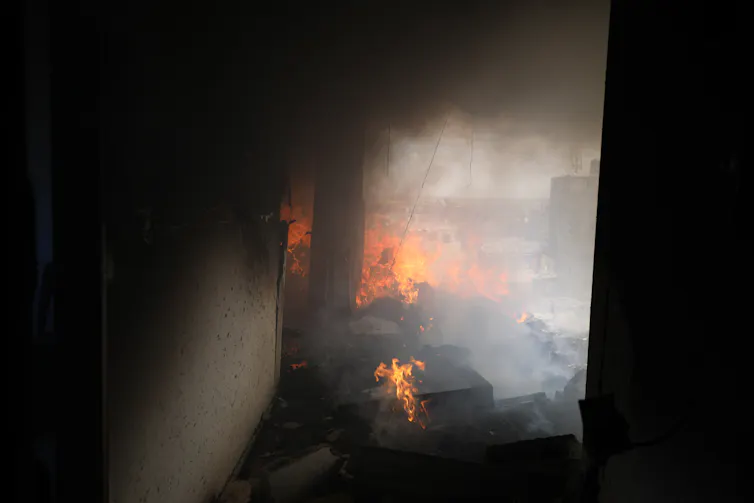 A fire and smoke in a building.