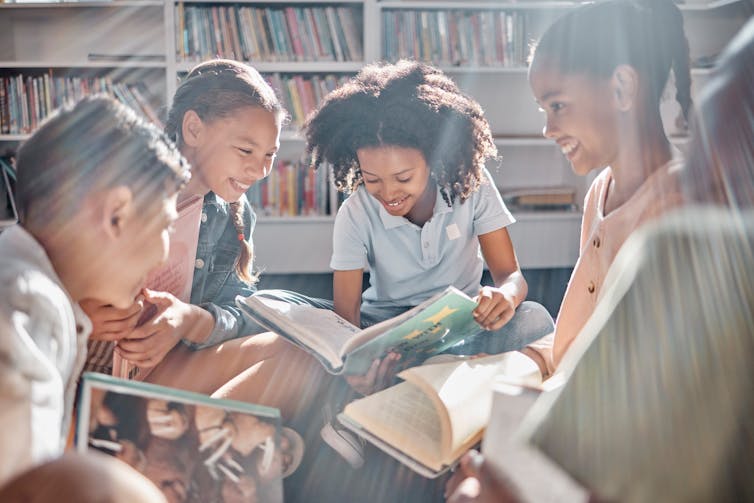Children reading in library