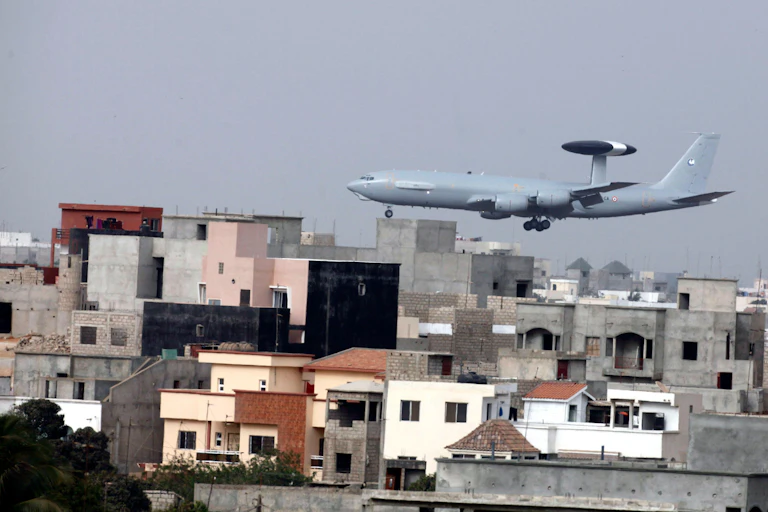 A French military aircraft flies over the Senegalese capital, Dakar.