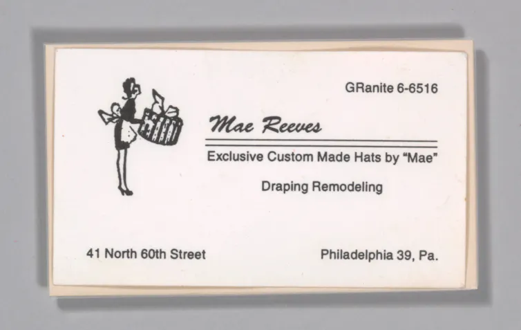 Business card for Mae Reeves with illustration of a maid delivering a large gift box