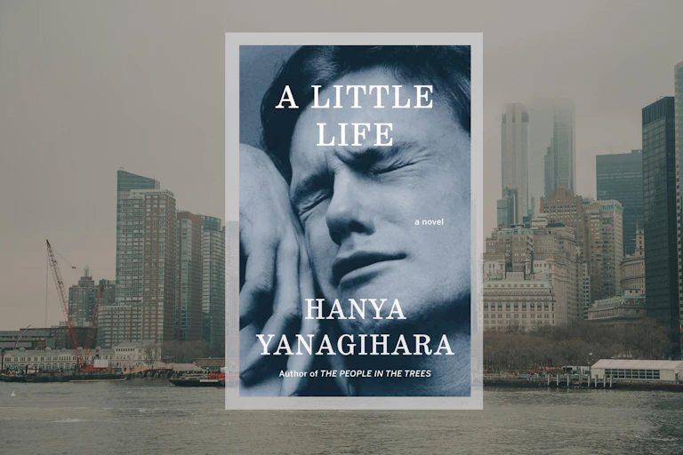 The book jacket of A Little Life showing a man crying, collaged over a photo of New York skyscrapers