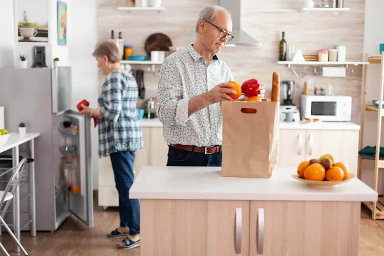 An older couple in a kitchen