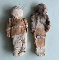 _Poppets_ de 1293 hechas con masilla y papel.