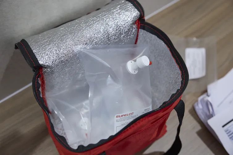A cooler bag filled with plastic bags that have air in them.