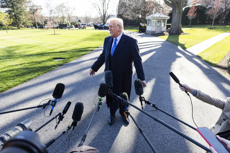 Donald Trump facing reporters.