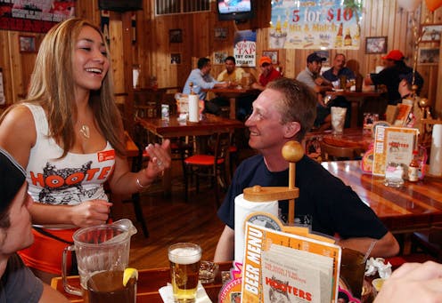 With Hooters on the verge of bankruptcy, a psychologist reflects on her time spent studying the servers who work there
