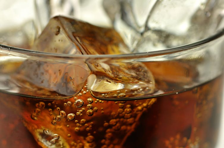 Close up of cola with ice.