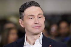A dark-haired man.