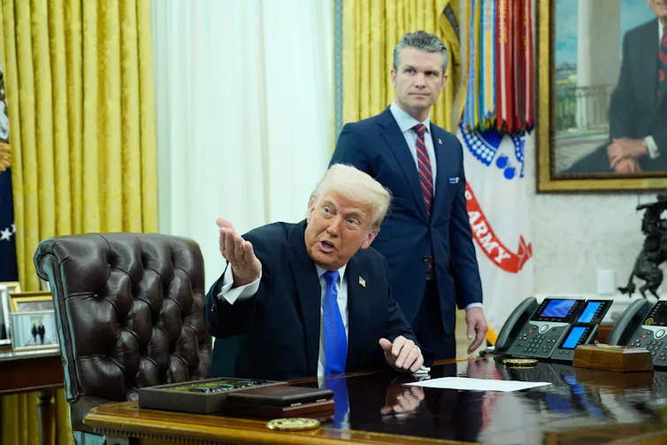 US President Donald Trump and Defense Secretary Pete Hegseth in the Oval Office.