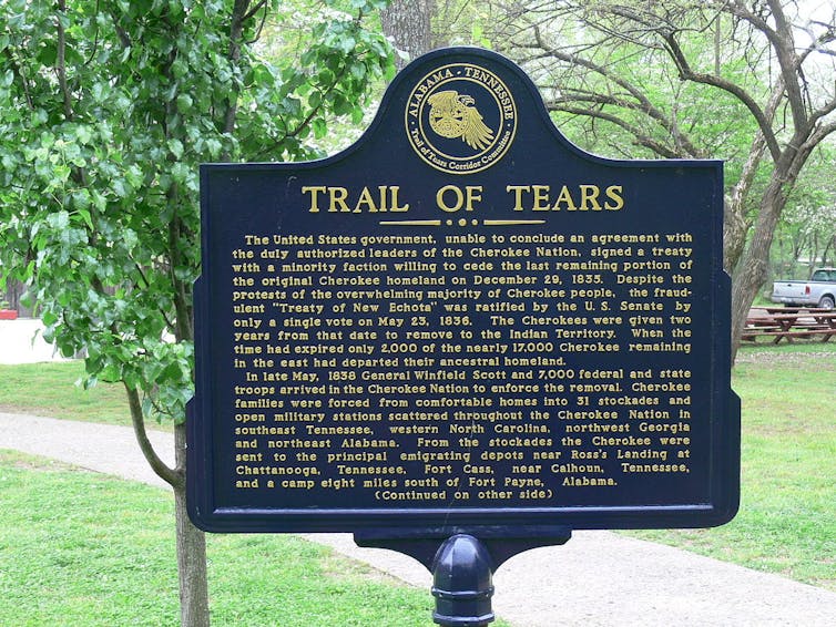 A signboard telling the story of the trail of tears.