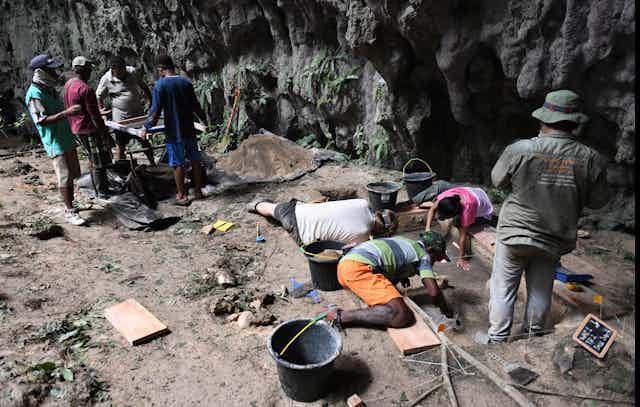 An archaeological excavation at Mololo Cave in West Papua.