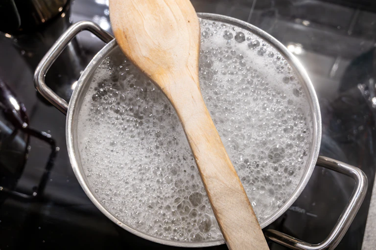 Seething Pot Can a wooden spoon really stop a pot from boiling over? Here’s the science