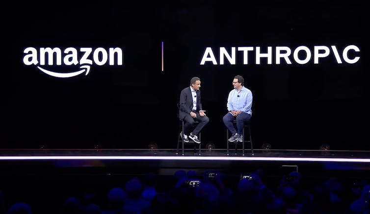AWS CEO Adam Selipsky in discussion with Anthropic CEO Dario Amodei.