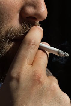Closeup of smoker smoking a cigarette