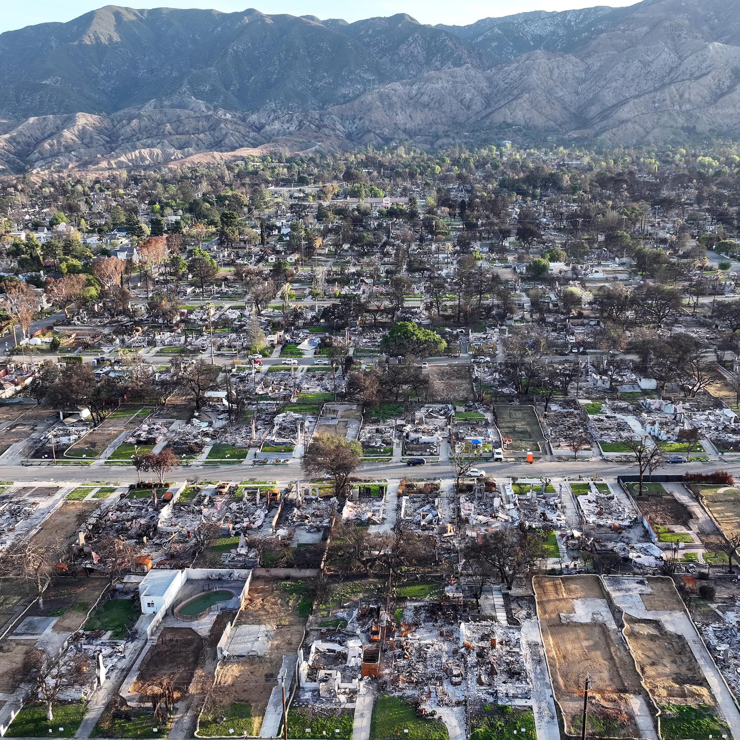 Aerial shot of fire-destroyed city, block after charred block
